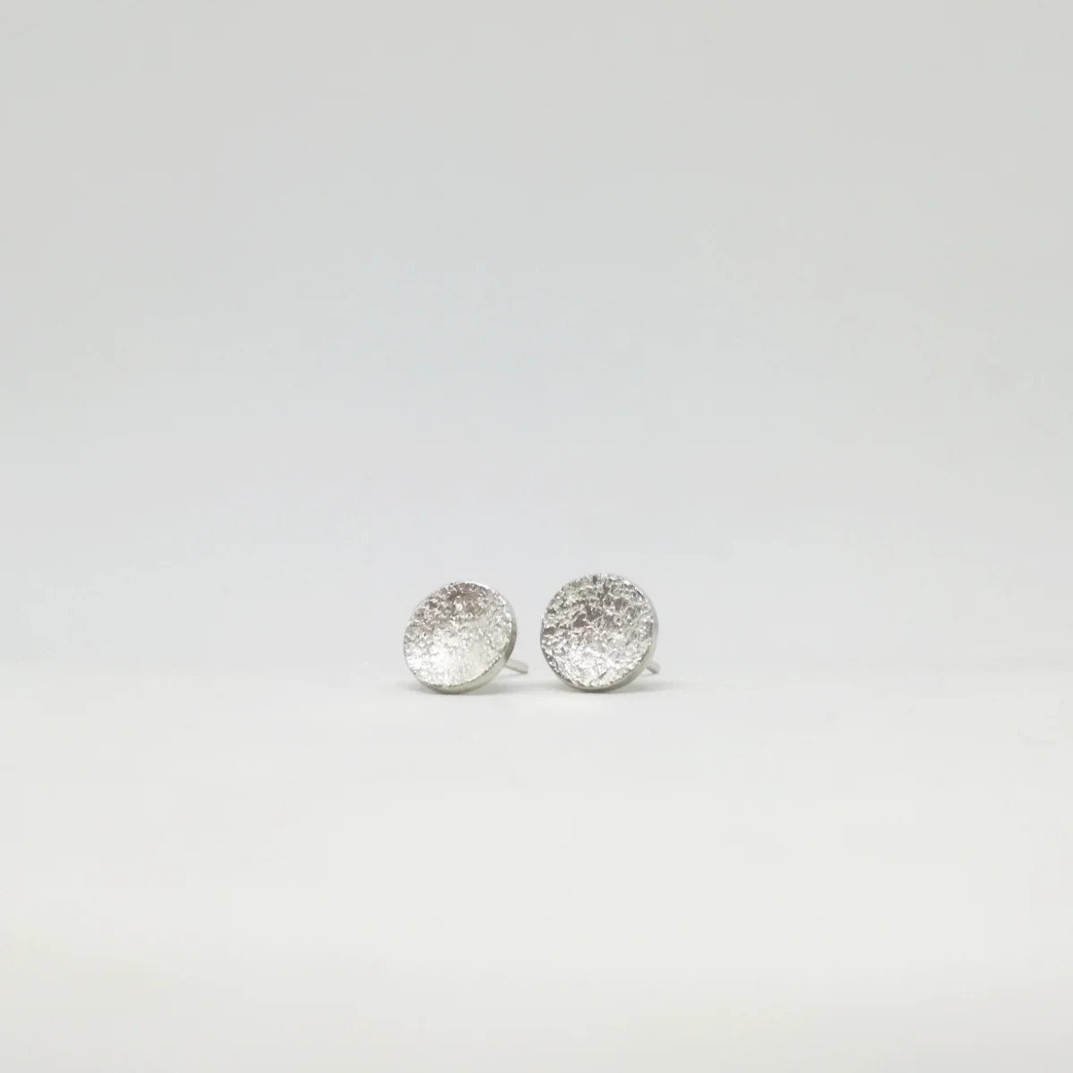 Pendiente plata textura